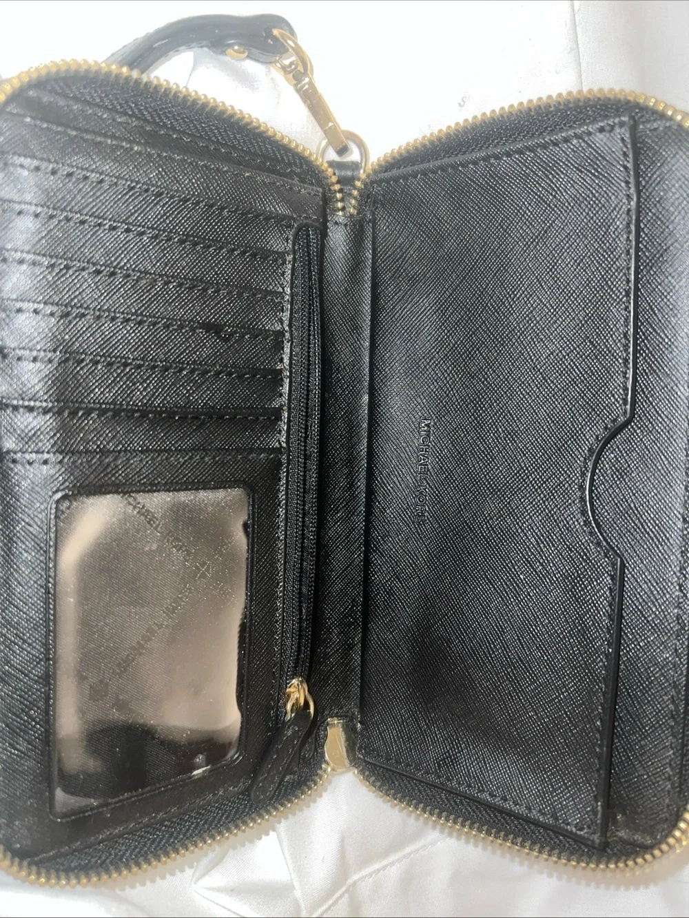 Michael Kors Black Leather Floral Embossed Zip Wallet with Gold Hardware